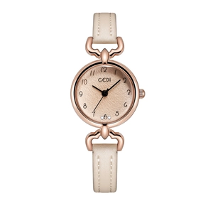 Close-up of elegant rose gold quartz watch with beige leather strap and spark pattern dial