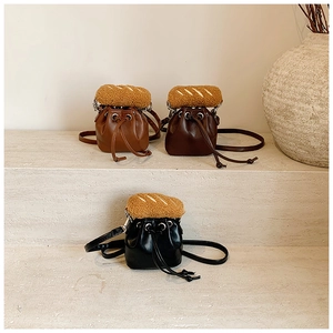 Three minimalist PU leather drawstring bucket bags with unique plush baguette decoration