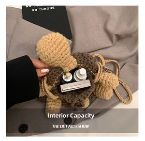 Internal capacity of hand-crocheted turtle bag holding skincare items and cosmetics