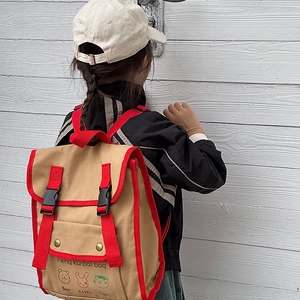 Kids vintage canvas backpack in khaki and red featuring cute cartoon animal prints