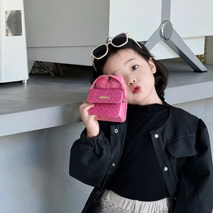Pink tweed mini handbag for girls featuring a metal logo and woven texture