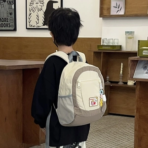 Kids color-block backpack with side mesh pockets and decorative chain for school