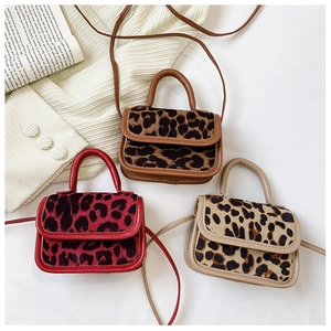 Detailed trio of mini leopard print handbags in brown red and beige with leather trim