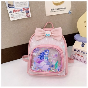Detail of pink toddler backpack featuring a sequined shell bow and mermaid sand pocket