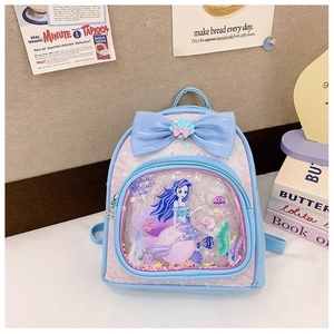 Detail view of pink and blue sequined mermaid backpack with bow and transparent pocket