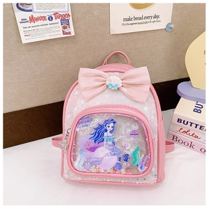 Close-up of pink sequin backpack with satin bow and transparent mermaid sand window
