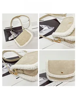 Detail of beige suede crossbody bag with plush white trim and gold hardware snap closure
