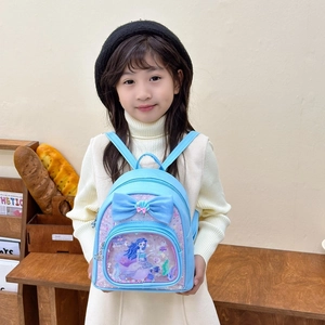 Cute blue girls backpack with mermaid print, sequins, and large bow for kindergarten