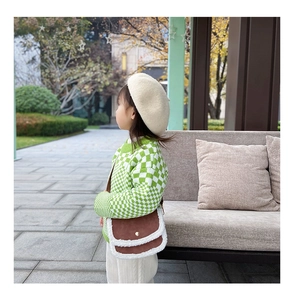 Girl's winter crossbody bag with brown matte finish and white plush trim details