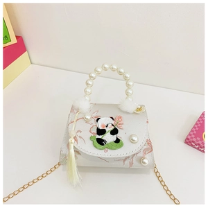 Detailed embroidery of a panda with lotus, pearl handle, and soft tassels on the bag