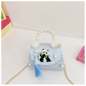 Detail of light blue girls' bag with panda embroidery, pearl handle, and soft tassels