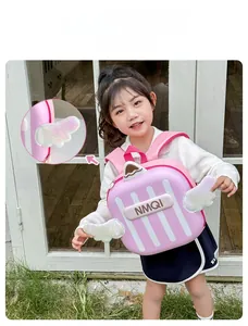 Detailed view of pink toddler backpack featuring sequined wings and striped eggshell design