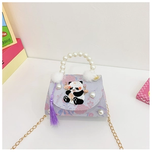 Detail of a purple floral kids bag with panda embroidery, pearl handle, and tassels