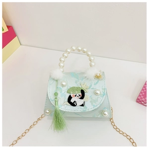 Detail of floral green kids handbag with cute panda embroidery and pearl handle strap