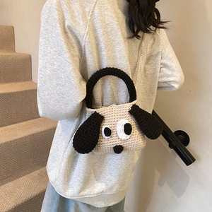 Handmade crochet cartoon dog shoulder bag with knitted handles for kids in beige and black