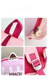 Detail of pink toddler backpack showing cartoon ears, sturdy handle, and breathable mesh back