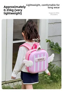 Close-up of lightweight pink kids backpack with white wing design and 0.35kg weight label