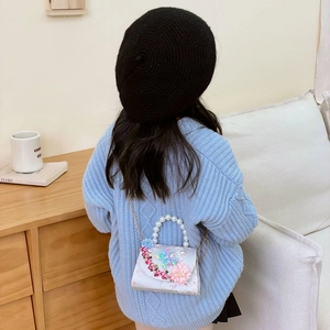 Sweet girls floral crossbody bag with pearl handle and butterfly embroidery details