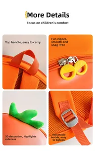 Detail view of carrot backpack showing sturdy handle, plush leaves and adjustable mesh straps