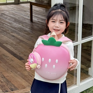Pink strawberry hard shell backpack for kids with a cute bunny charm and accessory bag