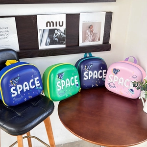 Detail showing space-themed kids backpacks in four colors with hardshell design