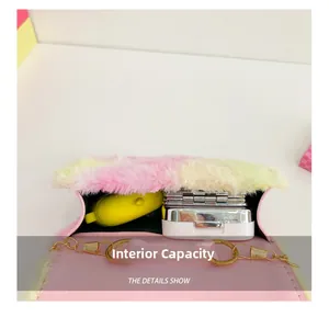 Detail shot of mini plush crossbody bag showing pink leather interior and storage space