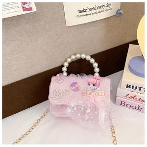Detail of pink pearl lace girl handbag with gold chain and love letter decorations