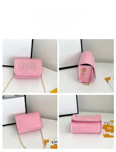 Detailed views of girls pink mini chain bag featuring a white pearl bow decoration