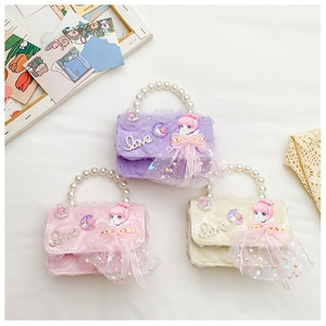 Detailed display of kids mini princess bags in purple, pink and cream with pearl handles