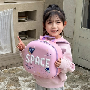 Pink hardshell toddler backpack with 3D space rocket theme and bright LED light details