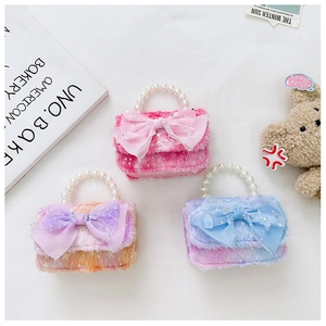 Mini sacs en peluche pour enfants rose et bleu avec nœuds et anses en perles