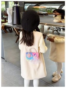 Detail of gradient plush kids bag with pearl handle and princess appliqué decoration