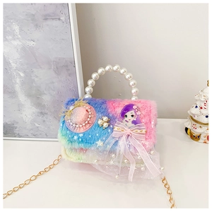 Detail of rainbow plush kids handbag with pearl handle and lace bow decoration
