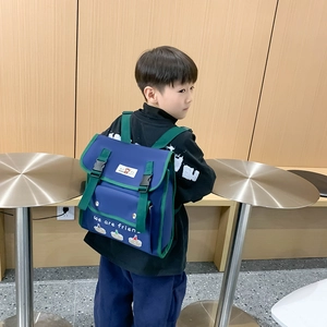 Cute cartoon bear kids backpack with navy and green contrast colors for daily use