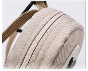 Detail of durable nylon fabric and smooth double zipper stitching on the mini utility pouch
