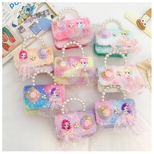 Detailed view of colorful plush kids handbags with pearl handles and princess designs