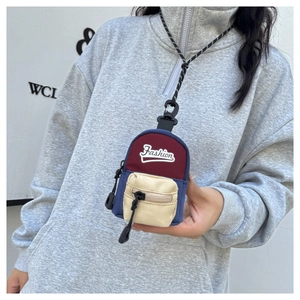 Mini color-block neck bag for kids featuring Fashion embroidery and durable lanyard