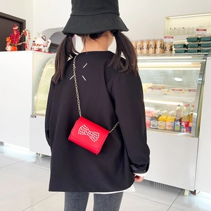 Girls red mini crossbody bag with pearl polka dot bow and golden chain strap
