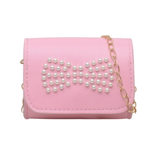 Pink mini crossbody bag for girls with pearl bow detail and golden chain strap
