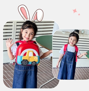 Detail of cute car cartoon toddler backpack showing wide red adjustable shoulder straps