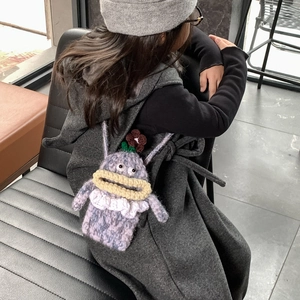 Handmade purple crochet monster crossbody bag for kids with cute yellow sausage lips