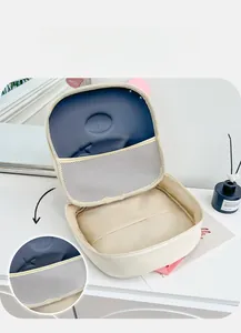 Detail view of children backpack inner compartment with mesh pocket and large storage space