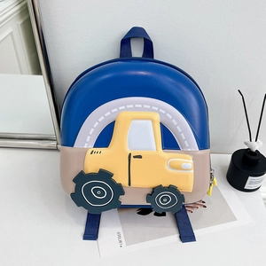 Detailed close-up of 3D construction truck design on durable kids hardshell backpack