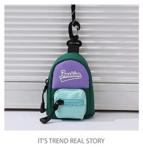 Detailed macro view of a colorful mini backpack coin purse with Fashion embroidery