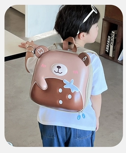 Detail view of the durable 3D hardshell EVA material on the cute brown bear backpack