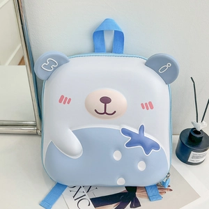 Detail of cute light blue 3D bear backpack for kids with a durable hard shell design