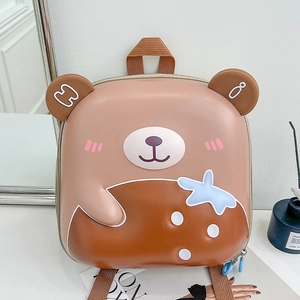 Close-up of cute cartoon bear hard shell backpack featuring durable EVA material and 3D ears