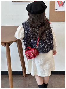 Detail of red oil wax leather mini crossbody bag for girls with gold buckle and slim strap
