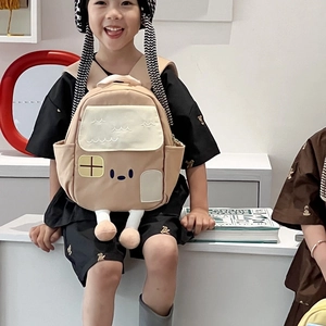 Cute cartoon house-shaped children's backpack in beige with plush legs for kids