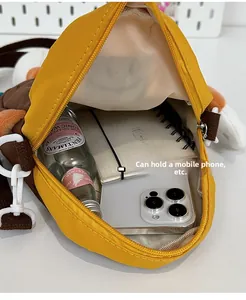 Detail view of the spacious inner compartment of the cute crossbody bag for phones